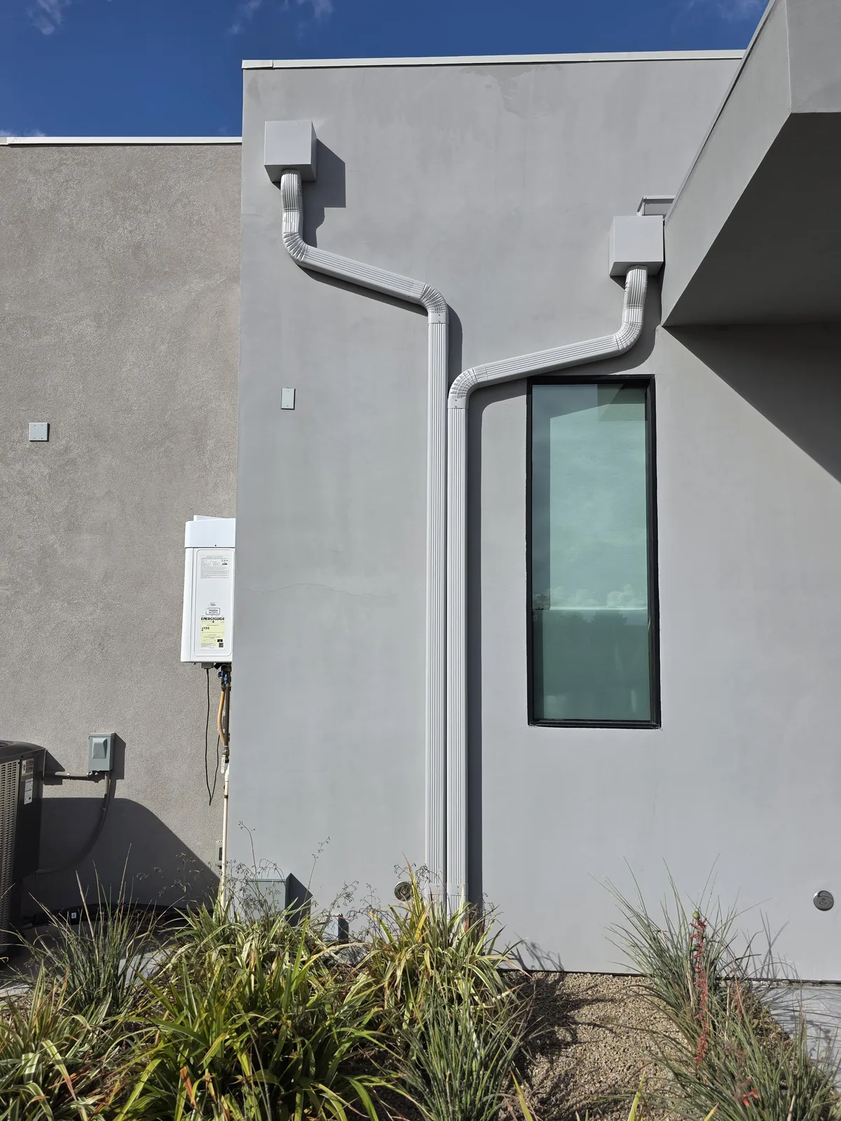 How Much Does It Cost to Replace a Downspout Drainage Pipe?